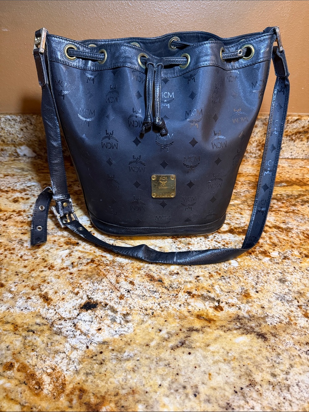 MCM Black Monogram Drawstring Bucket Hobo with Gold Plate